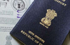 Fake passport user held at MIA